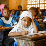 children learning in a classroom