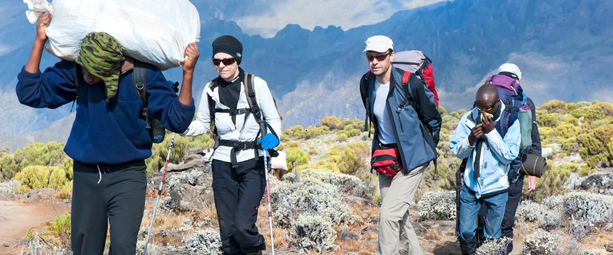 Kilimanjaro porters with fairly weighed loads